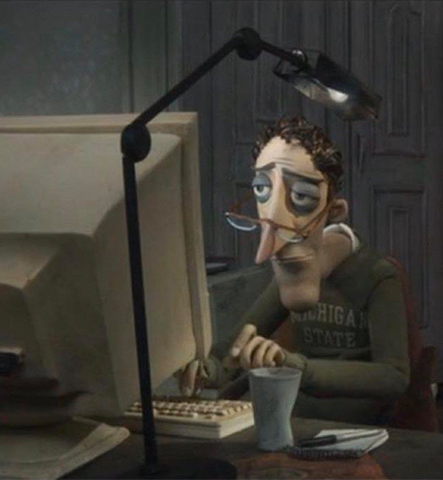Tired dad at computer